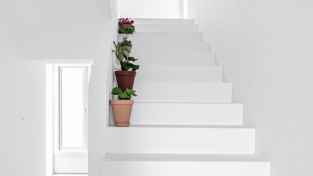 A staircase painted in white